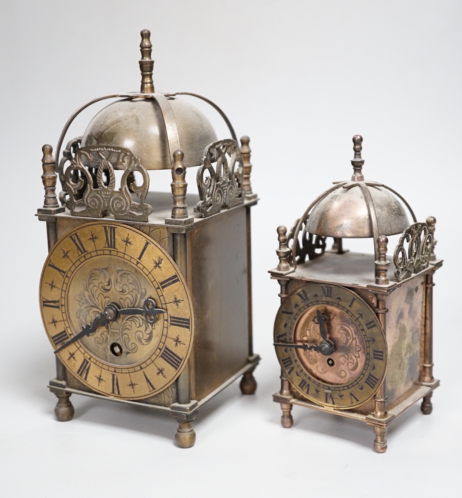 Two reproduction brass lantern clocks, tallest 24cm high